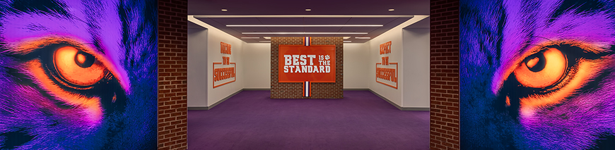 Head image that shows 'Best is the Standard' within a cutting edge training facility